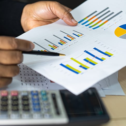 reviewing printed chart illustration